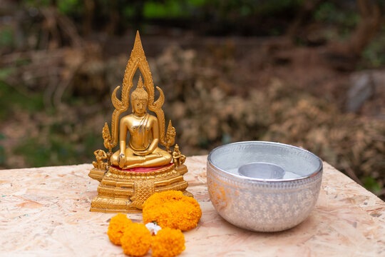 Bathing Buddha images on Songkran Day, Thailand