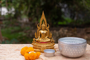 Bathing Buddha images on Songkran Day, Thailand