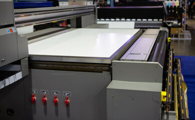Flatbed and roll UV printer. Printing industry.