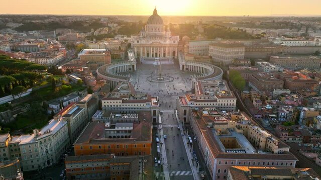 Aerial view of Vatican in Rome, flying above Basilica San Pietro in Italy at sunset, drone view of iconic landmark in Rome, skyline of Rome