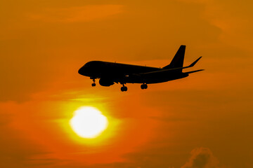 airplane in the sunset