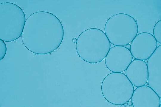 Oil And Water Blob Created Pattern Bubbles On An Art Image Baby Blue Background.