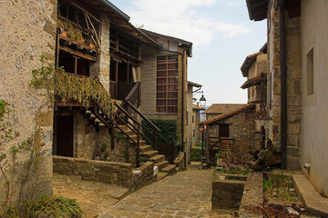 Historic residential buildings in Poffabro, a medieval village in the Val Colvera valley in...