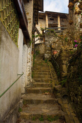 A residential street in Poffabro, an historic medieval village in the Val Colvera valley in Pordenone province, Friuli-Venezia Giulia, north east Italy
