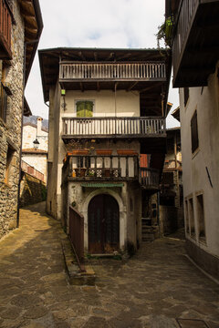 A residential street in Poffabro, an historic medieval village in the Val Colvera valley in Pordenone province, Friuli-Venezia Giulia, north east Italy
