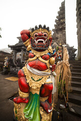 Fototapeta na wymiar traditional Balinese God statue in Central Bali temple. Indonesia