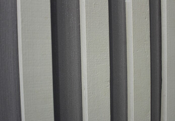 white wooden sticks on a gray background