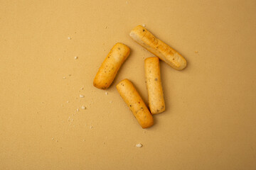 Grassini slide on a beige background