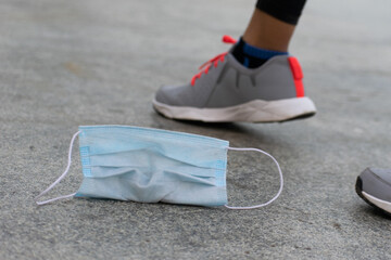 Picture showing that people throwing and walking away of mask post covid and pandemic. People got vaccination and no more mask. Mask free.