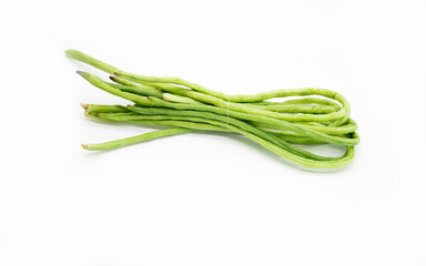 Heap of fresh yardlong beans (Asparagus bean) on shelf at a fresh market