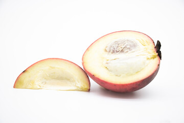 slices Gaab or Velvet apple fruit isolate on white background, selective focus