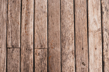 Background The texture of old wooden planks that have been nailed together.