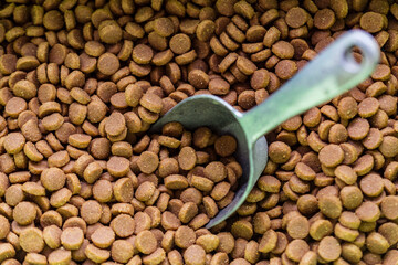 Pet food with shovel for serving. animal food.