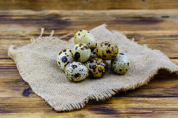 Spotted quail eggs on a sackcloth. Healthy nutrition