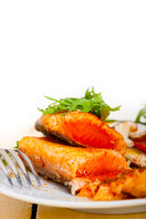 grilled samon filet with vegetables salad