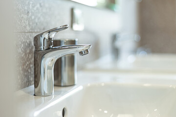 Modern washbasin with chrome faucet