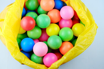 Fototapeta na wymiar Colorful balls of children's toys in plastic.