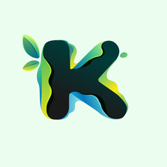 K letter eco logo with green leaves in hologram glitch style.