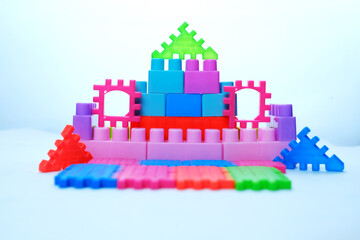 Colorful children's toys block puzzles. Disassembly of children's toys