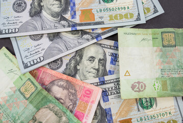 Close-up of hryvnia and dollars.