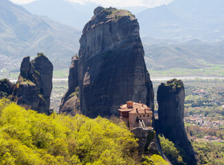 Obraz na płótnie Canvas Panoramic view of the Meteora Mountains and the Rusanou Monastery from the observation deck in Greece