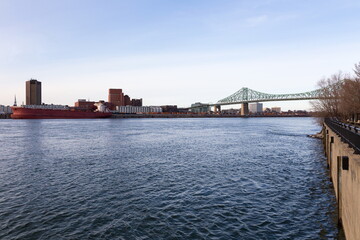 The St. Lawrence River, the 1930 cantilever Jacques-Cartier Bridge and skyline seen in late fall from Saint Helen&rsquo;s Island, Montreal, Quebec, Canada