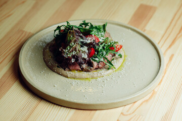 delicious appetizing food in a plate on the table in the river