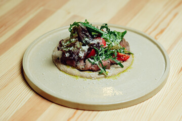 delicious appetizing food in a plate on the table in the river