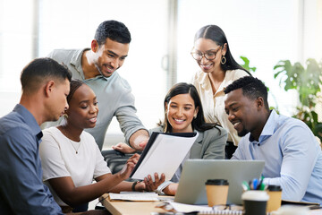 This is where ideas become reality. Cropped shot of a diverse group of businesspeople sitting in...