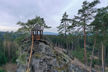 Small wooden chalet on the sharp rock