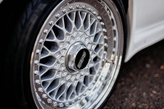 BBS logo close up on chrome silver luxury car rims.