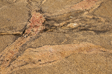 The surface of the granite rock as a natural background.