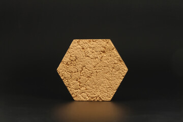 Empty texture gold stone platform eco podium on black copy space background. Minimal still life...
