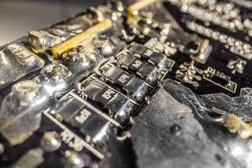 Closeup photo of damaged circuit board