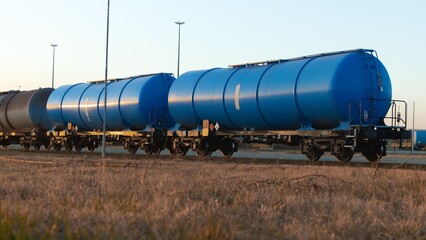 Fototapeta na wymiar Freight train transporting liquid fuel at depot