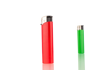Two colored lighters, macro, isolated on a white background.