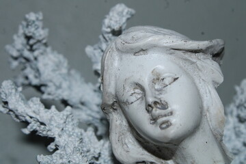 Mermaid Face Up Close With White Coral In The Background. 