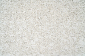 rough stucco texture background on an exterior building wall