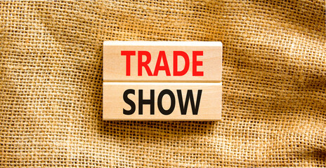 Trade show symbol. Wooden blocks with concept words Trade show on beautiful canvas background. Business economic financial trade show concept. Copy space.