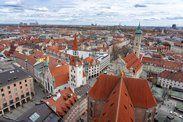 Fototapeta na wymiar areal view of Munich Germany with altes rathaus andheiliggeistkirche and red rooftops