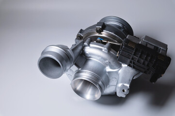 New car parts turbocharged, on a light background.