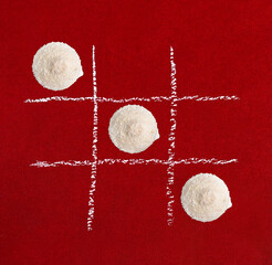 white coconut cookies on a red background.copy space