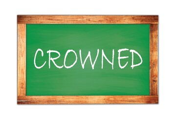 Obraz premium CROWNED text written on green school board.
