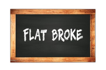 Fototapeta premium FLAT BROKE text written on wooden frame school blackboard.