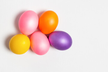 Colored Easter eggs isolated on white background. Flat lay, background, layout, top view, template.