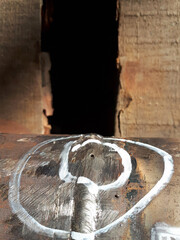 A weld defect in the form of a pair. Control of pipeline welds at an oil and gas plant in Russia