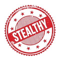 STEALTHY text written on red grungy round stamp.
