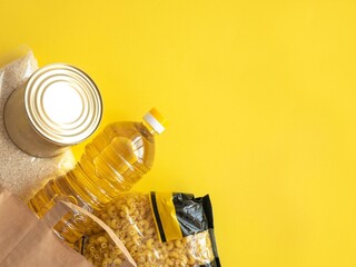 A paper bag with crisis food stocks for the period of the war. Buckwheat, canned food, pasta,...