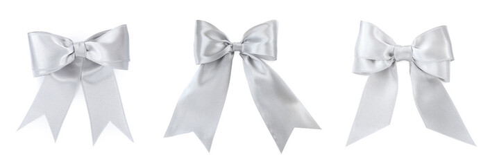 Set with beautiful silver ribbons tied in bows on white background. Banner design
