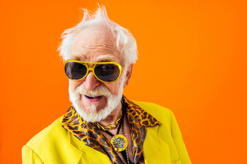 Cool senior man with fashionable outfit portrait - Funny old male person with cool and playful...